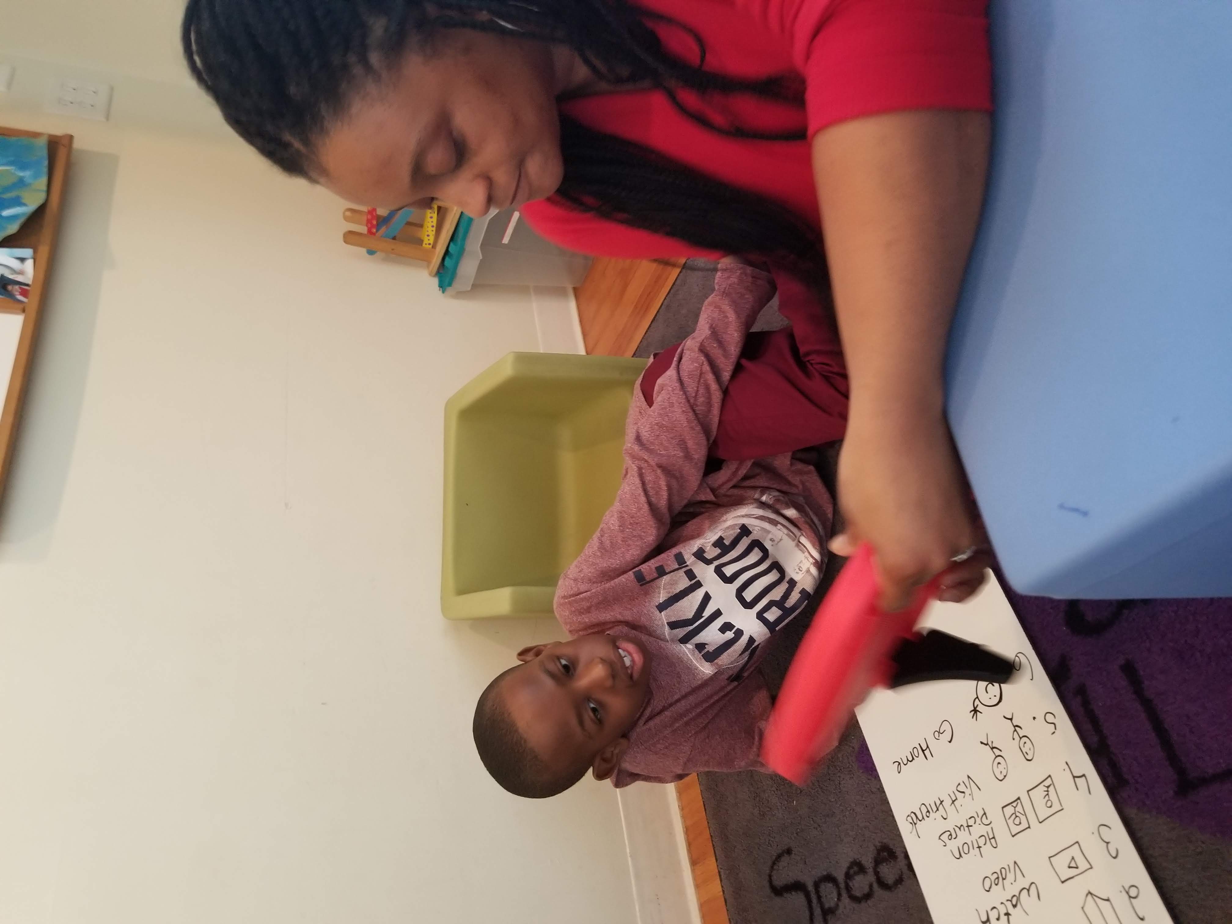 Therapist and child in a positive learning session