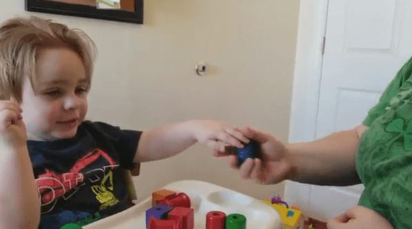 Speech therapist working with child
